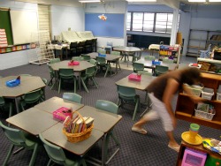 Coral checks the reading materials.